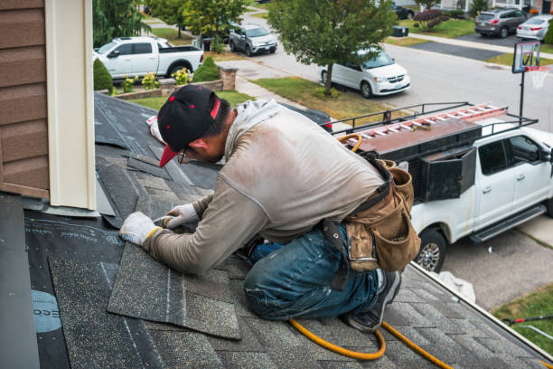 Professional Roof Replacement technician working in Dunlap, IA